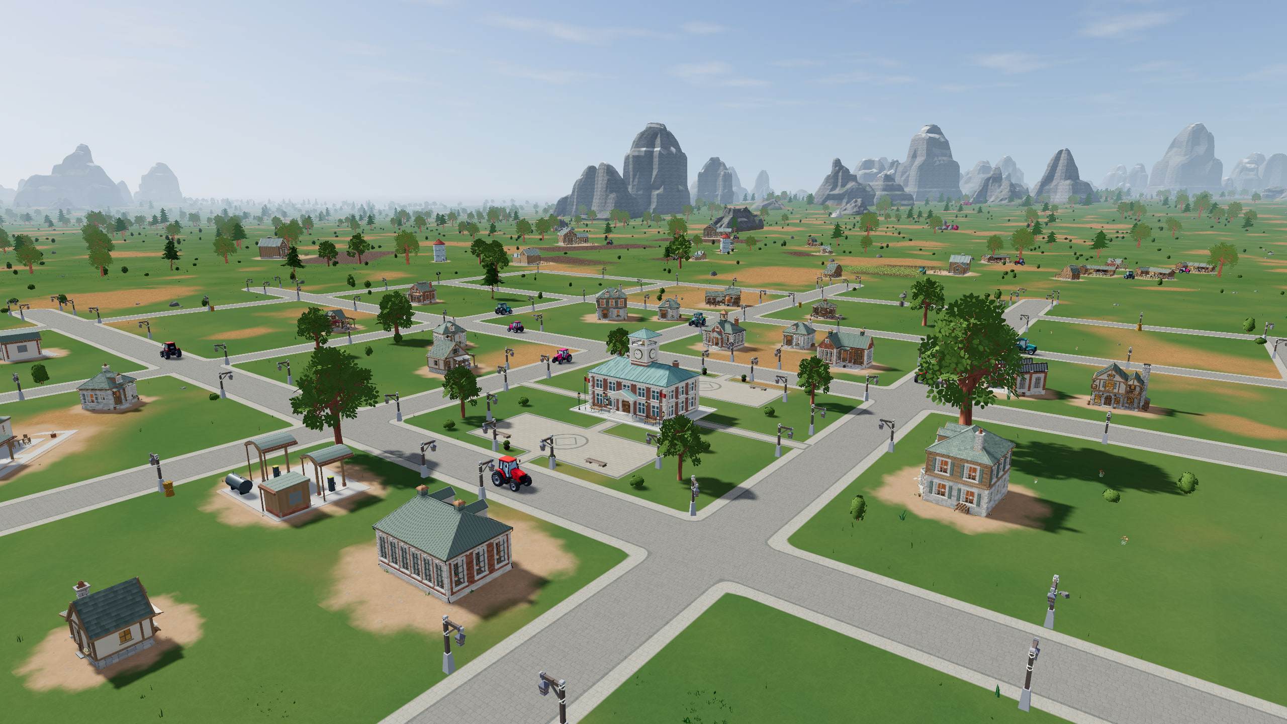 A town seen from above: a clock-towered Town Centre on its square, tree-lined streets, houses and businesses, with tractors on the roads and stone peaks on the horizon.
