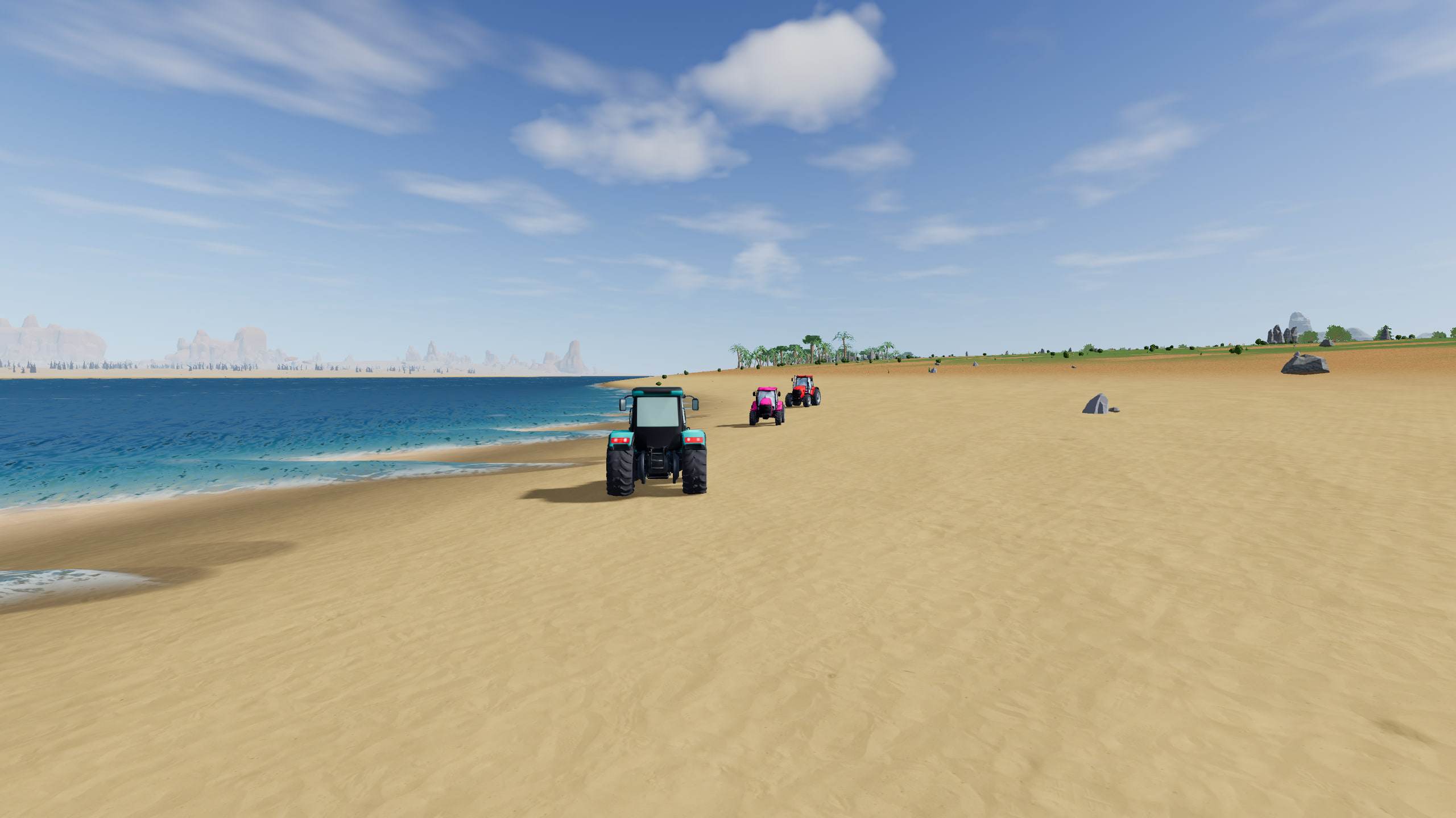 Teal, pink and red tractors driving along a wide sandy beach beside turquoise water, with palms on the shore ahead.